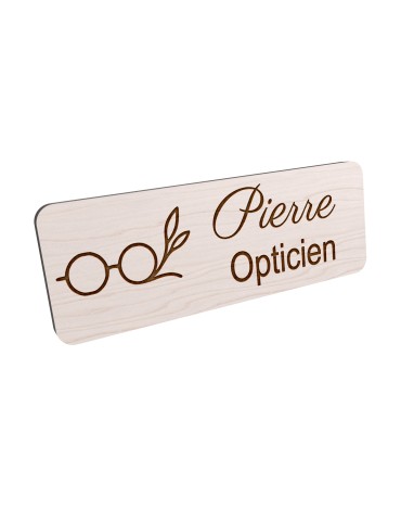 Badge personnalisé opticien, motif optique et lunetterie, vue en biais