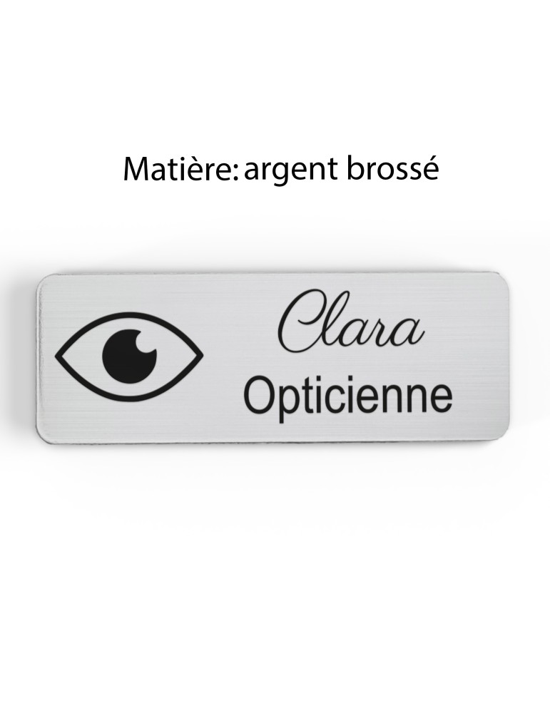 Badge personnalisé opticienne, motif optique et lunetterie, finition argent brossé