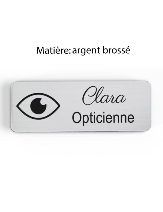 Badge personnalisé opticienne, motif optique et lunetterie, finition argent brossé
