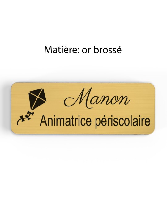 Badge personnalisé animatrice périscolaire, motif animation et activités pour enfants, finition or brossé