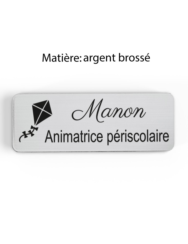 Badge personnalisé animatrice périscolaire, motif animation et activités pour enfants, finition argent brossé
