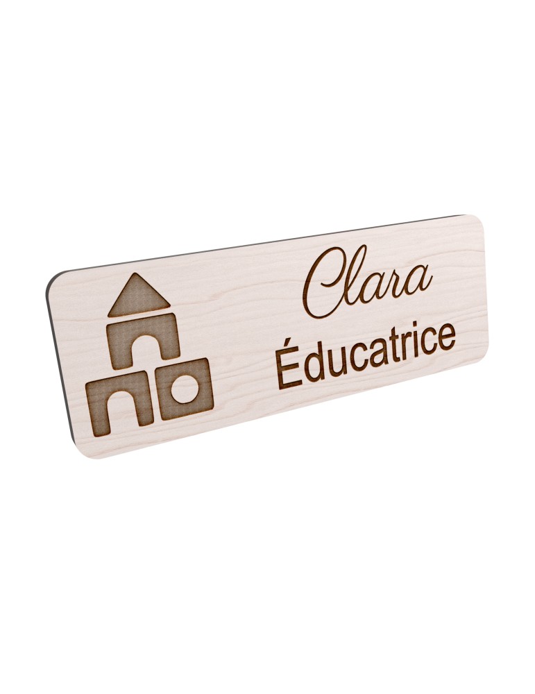 Badge personnalisé éducatrice, motif éducation et développement de l'enfant, vue en biais