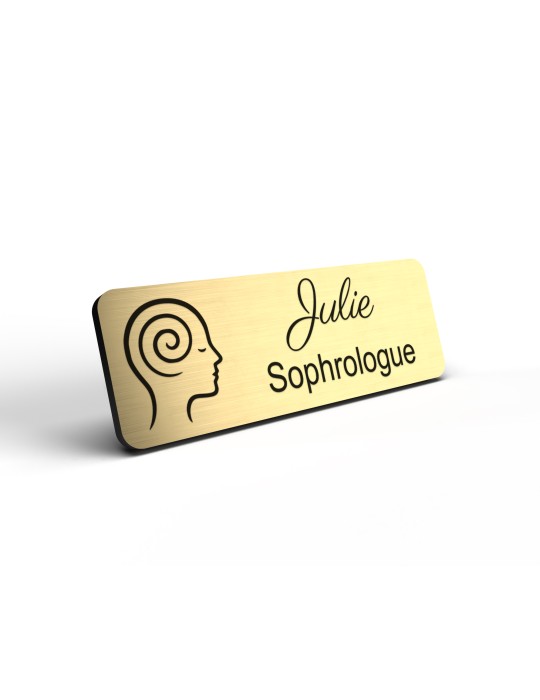 Badge personnalisé sophrologue, motif sophrologie et respiration, détail de la finition or brossé